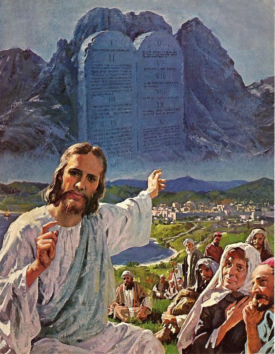 Painting of Jesus sitting atop the mount outside of Jerusalem, sharing His message with many eager faces. He points behind him to a vision of Mount Sinai with the Ten Commandments, etched in stone and rising out of the harsh rock.